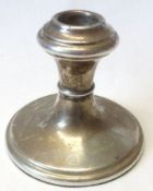 An Elizabeth II Silver Mounted Dressing Table Candlestick in Capstan style, loaded base, 3 ½”