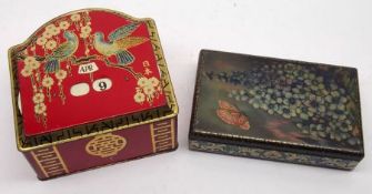 A George Bassett & Co Confectionary Tin, with oriental style decoration, inset with perpetual date