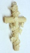 A late Victorian Ivory (or Bone) large Cross with ivy leaf entwining, measuring 69m x 34mm