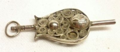 An unusual elaborate white metal filigree work Watch Key 50mm long