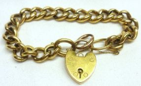 An early 20th Century yellow metal Hollow Curb Link Bracelet with padlock, the padlock dated 1906,