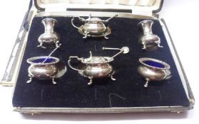 A George V Cased Six Piece Condiment Set of circular baluster form, with beaded rims, each item