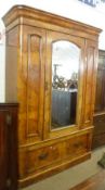 A Victorian Burr Walnut Veneered Mirror Door Wardrobe on single drawer base, with moulded cornice,