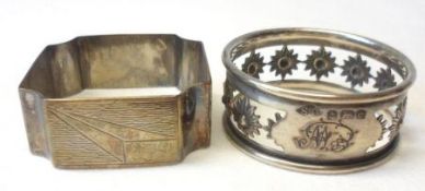 A Mixed Lot of two Napkin Rings, one of shaped square design with engine-turned decoration,