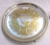 A Victorian Circular Electroplated (on brass) Salver, the worn field engraved with floral and