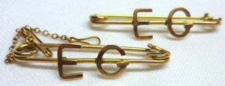 Two unmarked yellow metal Bar Brooches, each with the raised initialled “E G”, weighing in total
