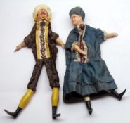 A pair of early 20th Century European Glove Puppets, male and female characters, each with
