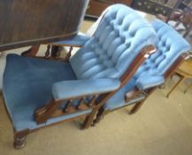 A pair of Victorian Blue Upholstered Button Back Armchairs, the arms with spindle supports, raised