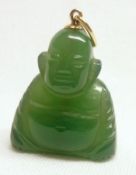 A Miniature Jadeite Buddha Pendant, 29mm drop