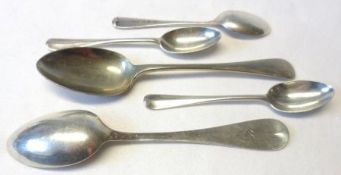 A Mixed Lot of four small hallmarked Silver Spoons and a Sterling example with naturalistic