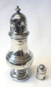 A George V Baluster Caster, Birmingham 1922, 5 ½” tall (many dents throughout); together with a