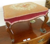 A Rosewood Rectangular Stool with grospoint wood embroidered seat, raised on four cabriole supports,