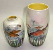 Two Royal Doulton Decorative Baluster Vases, decorated in colours with scenes of fish amidst seaweed