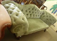 An early 19th Century Mahogany Large Sofa with green draylon upholstered button back, heavy scrolled