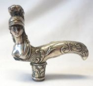 A late 19th/early 20th Century Figural Cane or Parasol Handle, in the form of a helmeted female,