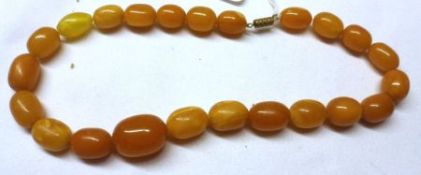 A Vintage Amber-style Graduated Bead Necklace