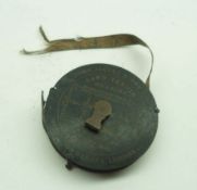 A Vintage John Jaques & Son Lawn Tennis Measure inscribed on one side with tennis court measurements