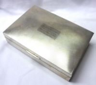 A mid-20th Century white metal encased Cigarette Box (unmarked), the slightly domed engine-turned
