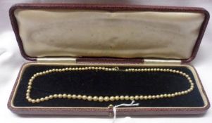 A Single Strand Cultured Pearl Necklace, with yellow metal clasp, stamped “9ct”