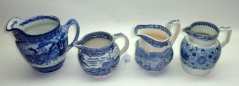 A Collection of four blue and white decorated Jugs, to include Royal Doulton Jug decorated with
