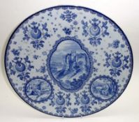 A Bonn blue printed circular Wall Plate, decorated with vignettes of scenes, includes a castle and