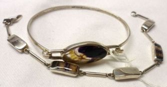 A hallmarked Silver Panel Bracelet with two small sections of Blue John, 9cm long; together with a