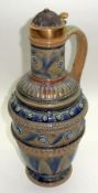 A Royal Doulton Stoneware Large Balustered Ewer, the lid formed as a formerly silver plated jockey’s