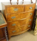 A Victorian Mahogany Bow Fronted Chest of two short and three full width drawers on splayed feet (