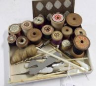 A small box containing a quantity of assorted Bone and Mother-of-Pearl handled Sewing Implements,