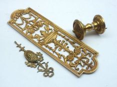 A decorative Brass Door Fingerplate, Handle and Escutcheon