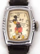 A 1939 Mickey Mouse Wristwatch, manufactured by Ingersoll, with chromium case and plain second hand,