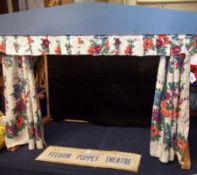 A mid-20th Century Pelham Puppet Theatre of wooden dowelled frame construction with black fabric