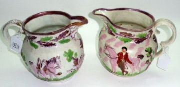 A near pair of 19th Century Puce Lustre Jugs, of baluster form, each decorated with green detail and