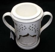 An early 19th Century Creamware/Pearlware two-handled Cylindrical Warmer, with pierced surround