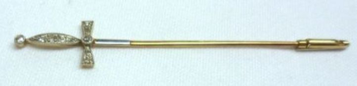 An attractive early 20th Century Stick Pin, in the form of a sword with small old cut Diamonds to