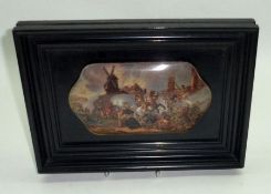 A Prattware Oblong Pot Lid, decorated with scene “War” (After Wouvermann), in an ebonised frame,