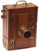 A late 19th Century French Half-Plate Camera, mahogany with brass fittings