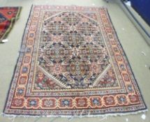 A Caucasian Carpet, triple gull border, central panel of geometric rosettes etc, mainly black and