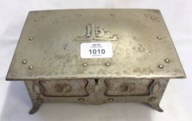 An interesting Arts & Crafts period Pewter Jewel Box in a form of a casket, the slightly domed lid