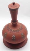 A Terracotta Covered Vessel on Stand, of shaft and bulb form, decorated in colours with panels of