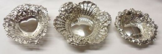 Two early 20th Century Bon-Bon Dishes, one of shaped circular design with embossed ribbon, scroll