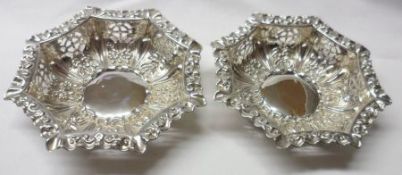 A good pair of Edwardian shaped octagonal Bon-Bon Dishes, with embossed serrated wavy edges, pierced