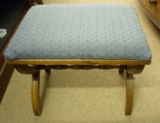 A “X” Framed Mahogany Stool with blue upholstered seat, 20” long