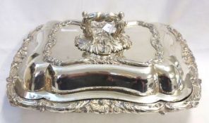 A Victorian Sheffield Plated Entrée Dish and Lid of shaped rectangular form, the base with shell and