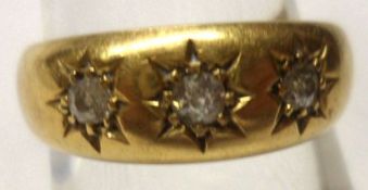 An Edwardian hallmarked 18ct Gold three small Old Cut Diamond Ring in gypsy style, hallmarked for