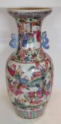 A large 19th Century Canton Baluster Vase, of typical tapering form, painted predominantly in