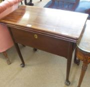 A 19th Century Bi-Fold Combination Mahogany Tea Table and Card Table, fitted with internal storage