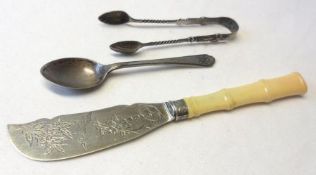 A Mixed Lot comprising: a Victorian Butter Knife with naturalistically engraved blade and carved