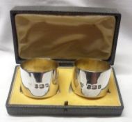 A Cased Heavy Pair of George VI Napkin Rings, of plain circular form, large specimen hallmarks for
