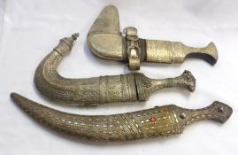 Arab Jambiya, curved blade 7 ¼”, decorative metal hilt and sheath + two other Arab Jambiyas (3)